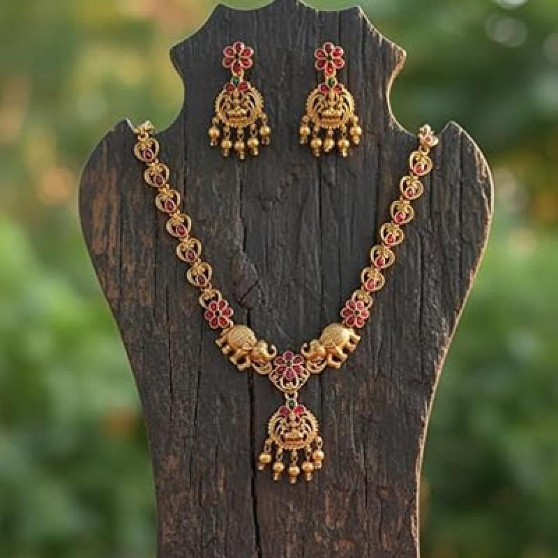 Traditional Antique Matte Gold Plated Temple Jewelry Necklace and Earring Set featuring Goddess Lakshmi and Elephant Motifs adorned with Ruby and Gree