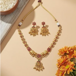 Traditional Antique Matte Gold Plated Temple Jewelry Necklace and Earring Set featuring Goddess Lakshmi and Elephant Motifs adorned with Ruby and Gree
