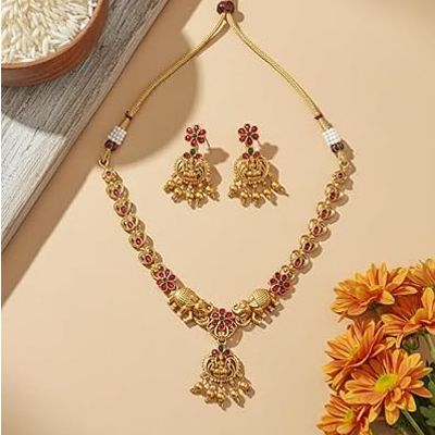 Traditional Antique Matte Gold Plated Temple Jewelry Necklace and Earring Set featuring Goddess Lakshmi and Elephant Motifs adorned with Ruby and Gree